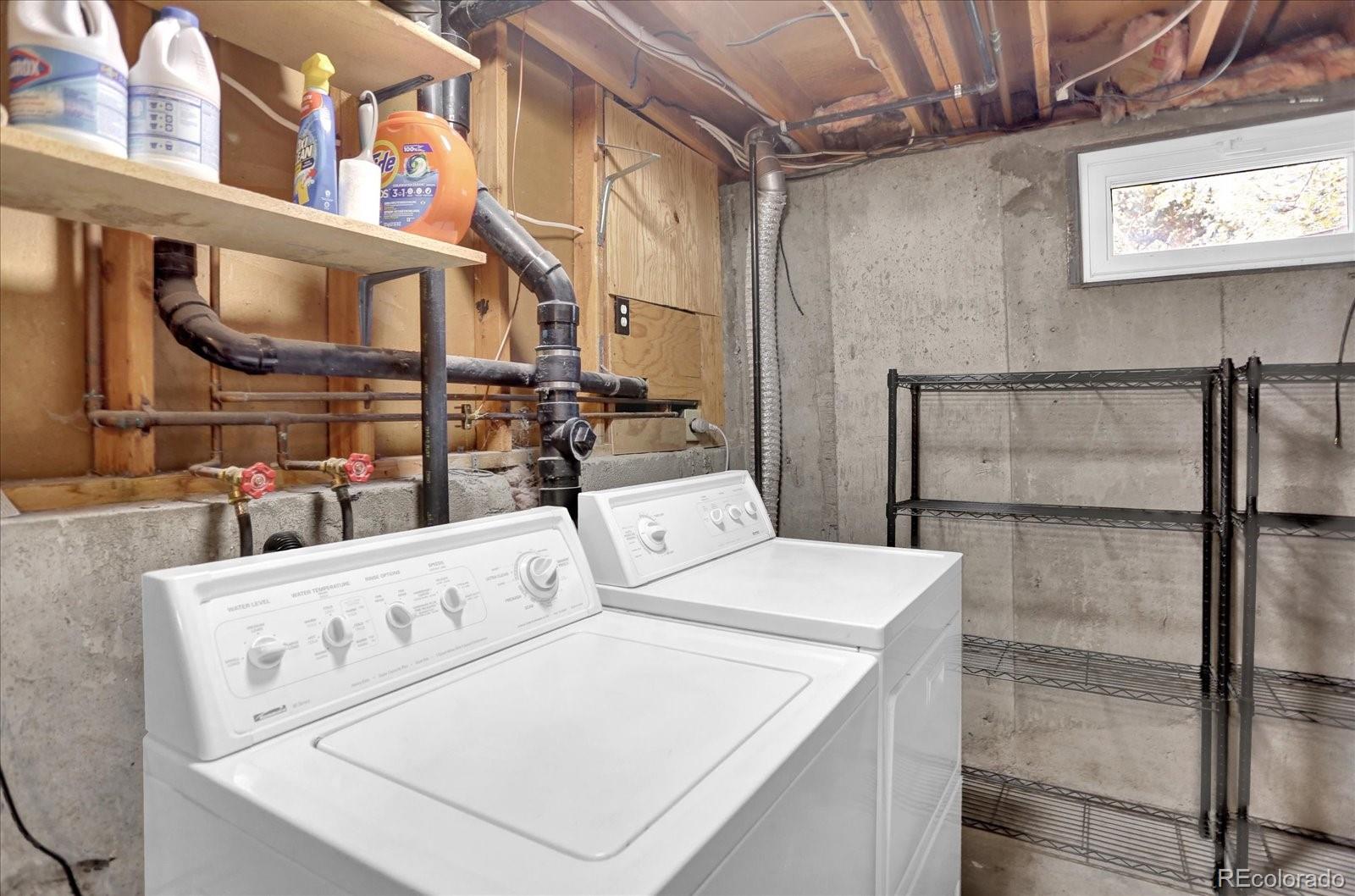 3754 South Walden Way Aurora, CO 80013 - Photo 27 of 32 a utility room with dryer and washer