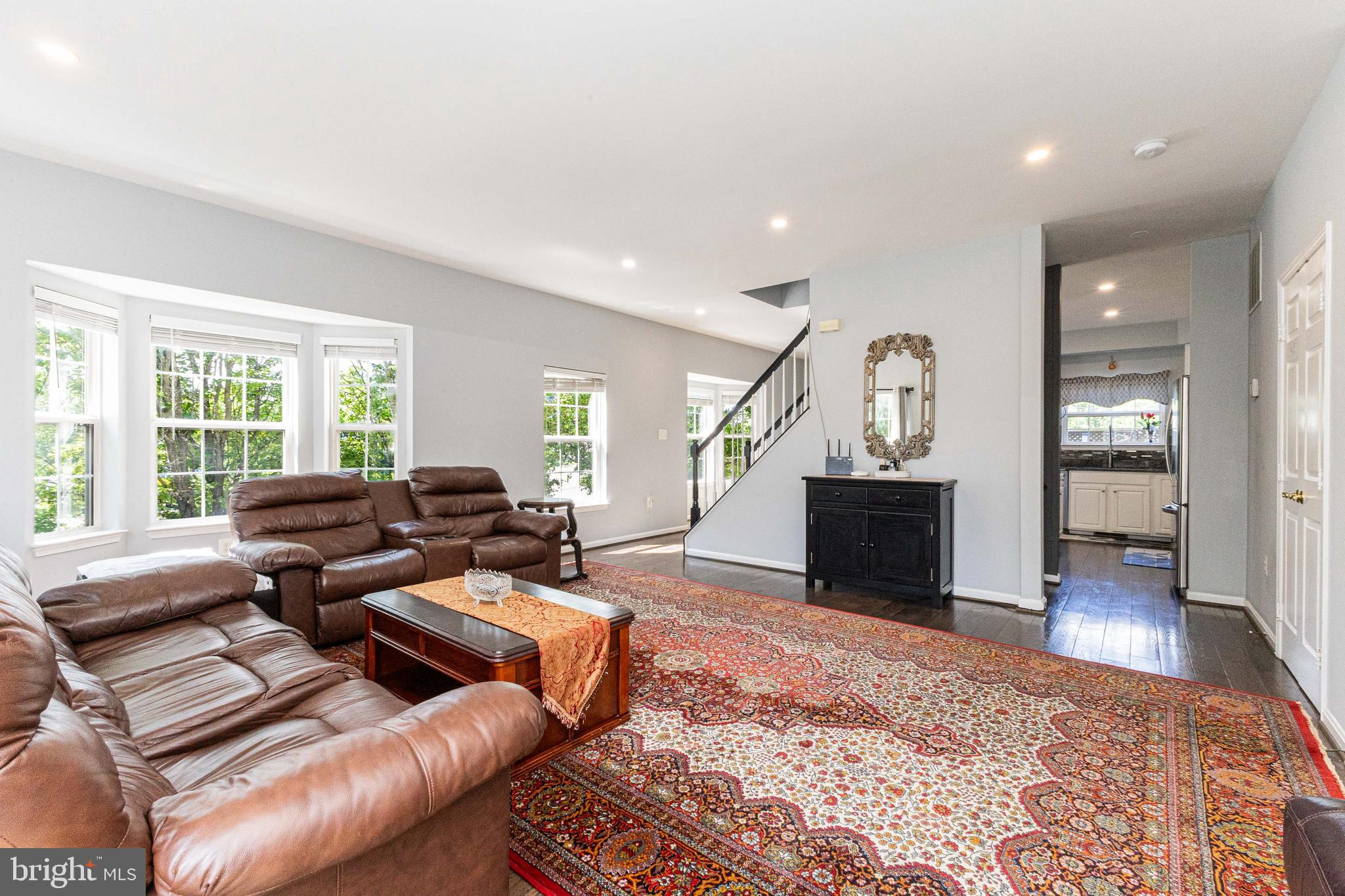 8226 Bates Road Lorton, VA 22079 - Photo 12 of 20 a living room with furniture and a fireplace