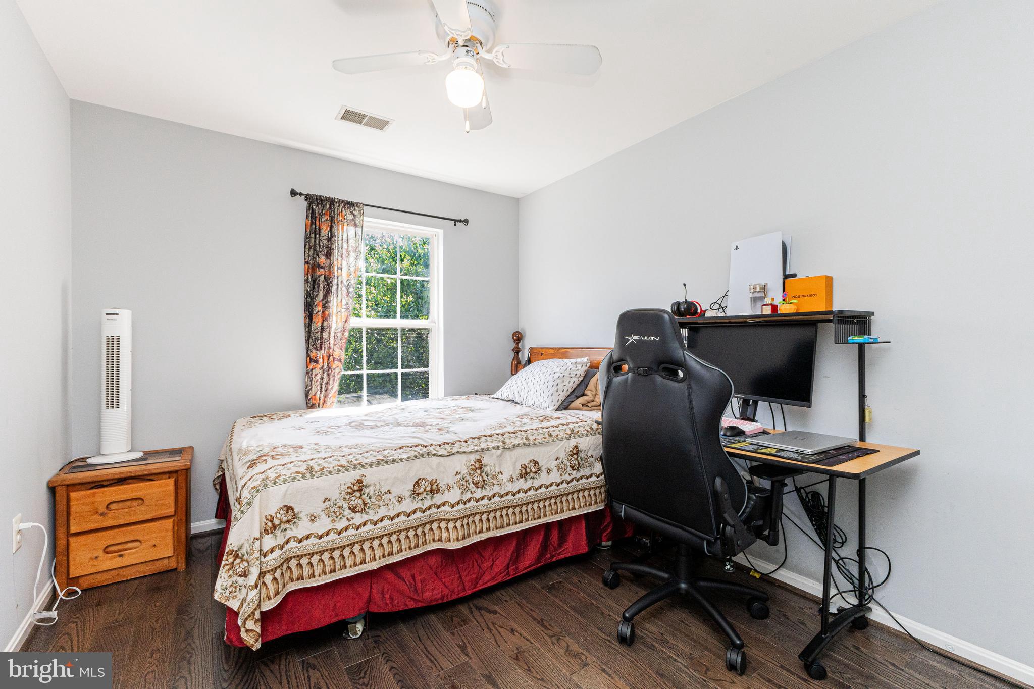 8226 Bates Road Lorton, VA 22079 - Photo 17 of 20 a bedroom with a bed and a window
