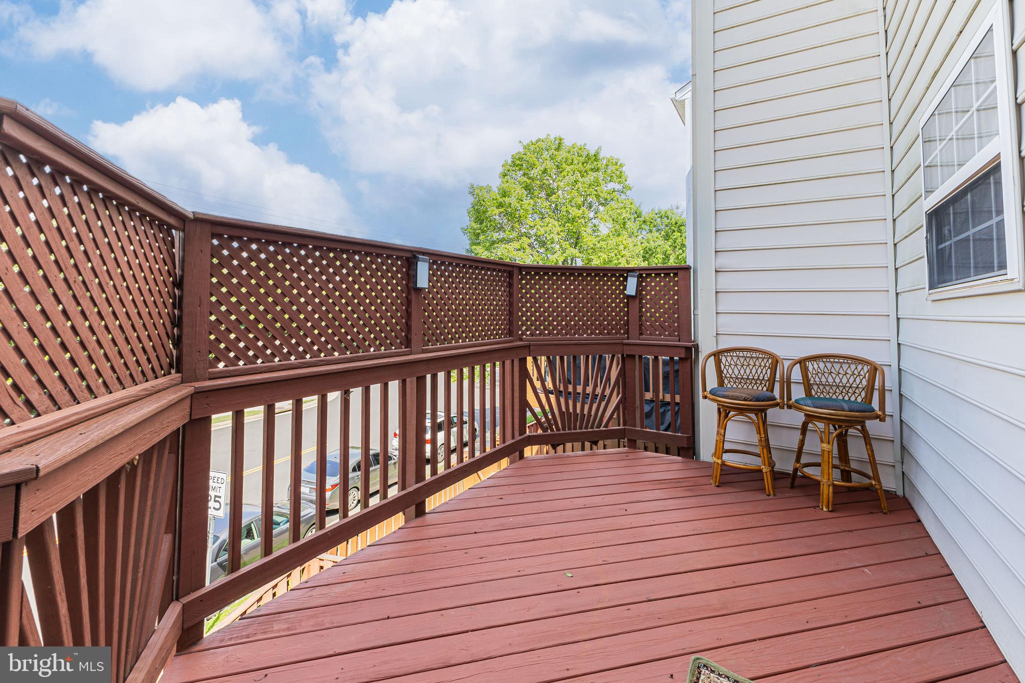 8226 Bates Road Lorton, VA 22079 - Photo 20 of 20 a view of a wooden deck with a patio