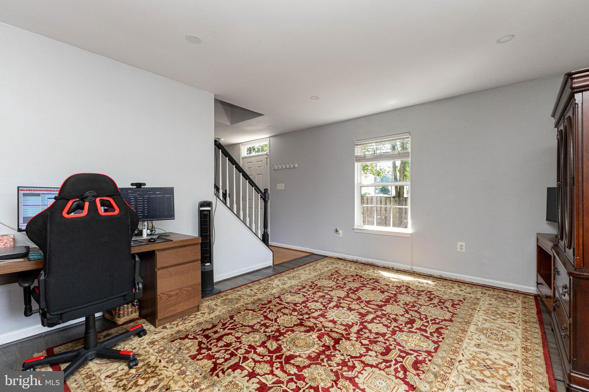 8226 Bates Road Lorton, VA 22079 - Photo 5 of 20 a view of a livingroom with wooden floor and a window