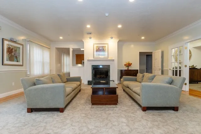 a view of an empty room with a fireplace