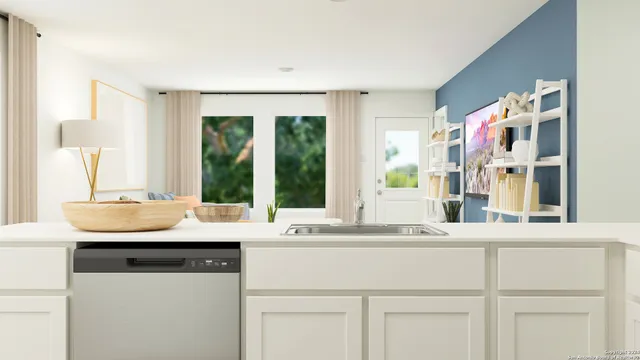 a kitchen with a sink and a window