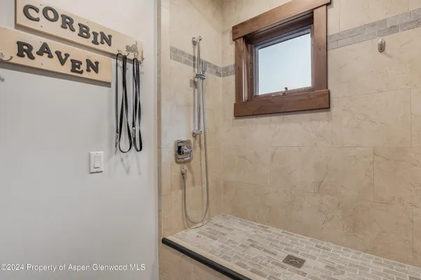 a kitchen with stainless steel appliances granite countertop a stove microwave and sink