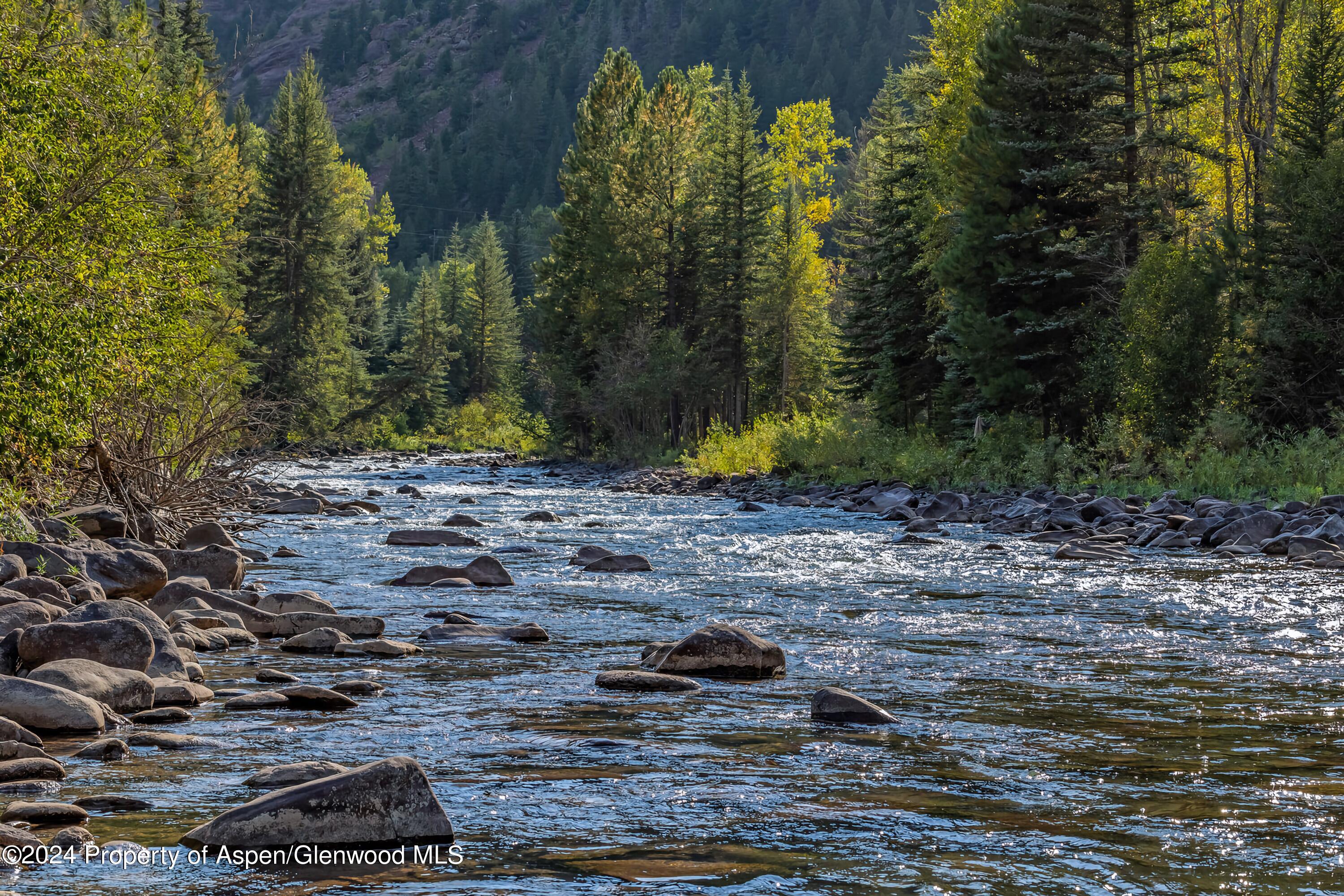 900 Dorais Way Redstone, CO 81623 - Photo 57 of 63 60-river-rocks- trees