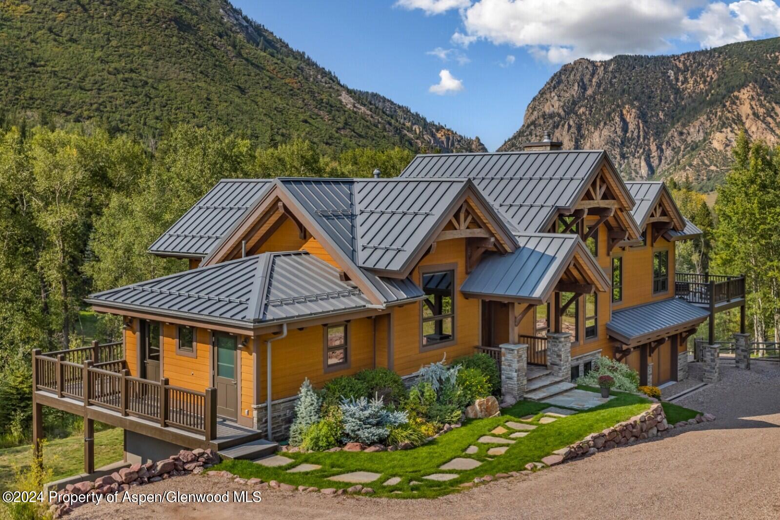 900 Dorais Way Redstone, CO 81623 - Photo 9 of 63 8-drone of driveway elephant mountain