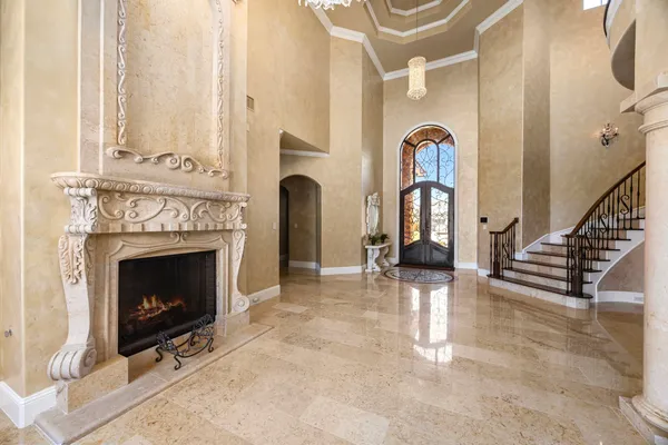 a view of an entryway with a fireplace