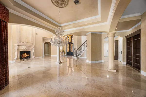 a kitchen with stainless steel appliances granite countertop a stove and cabinets