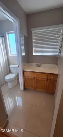 a bathroom with a sink a toilet and a bathtub