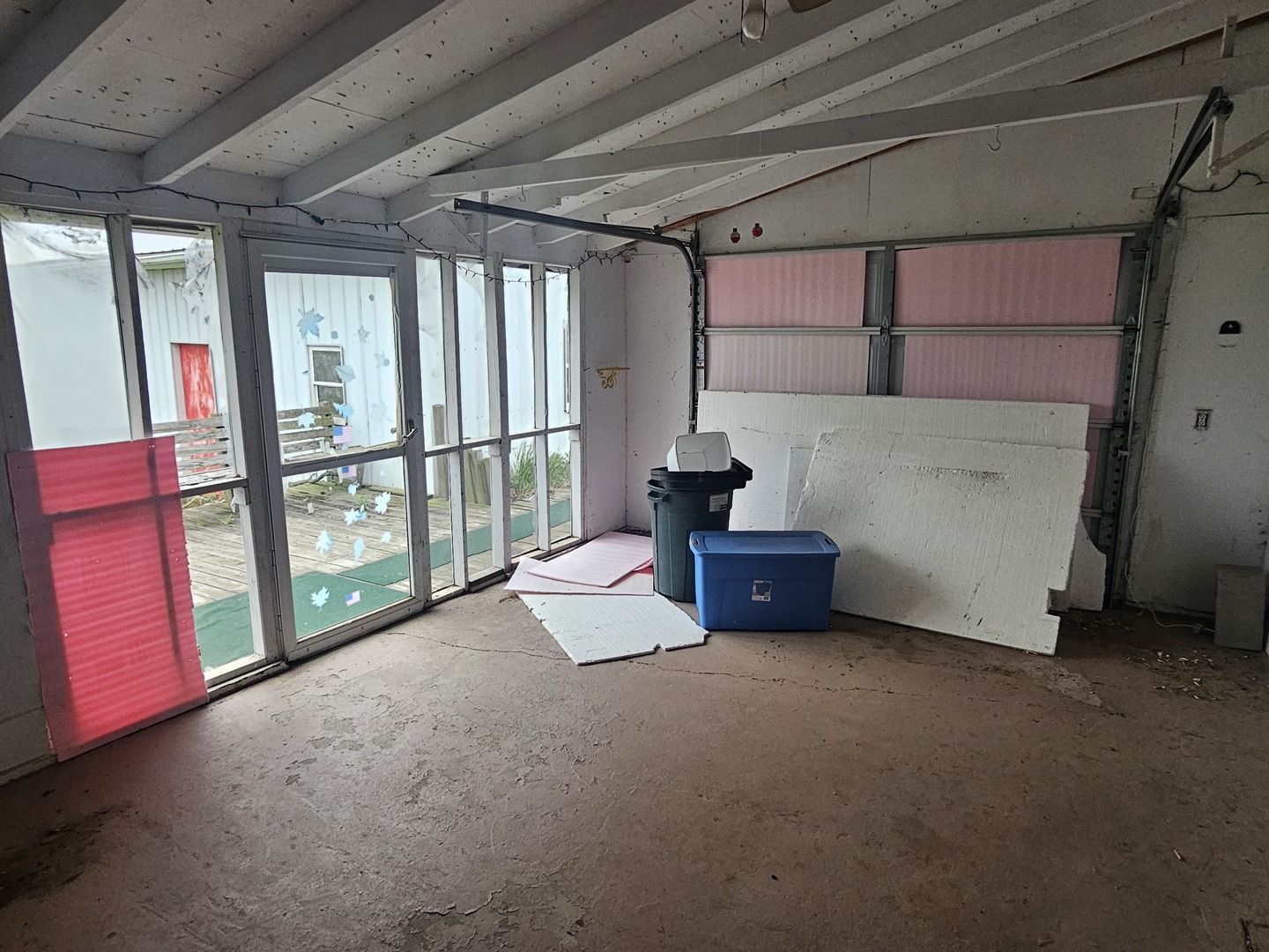 23018 Freeport Road Sterling, IL 61081 - Photo 17 of 19 a view of an empty room with a balcony