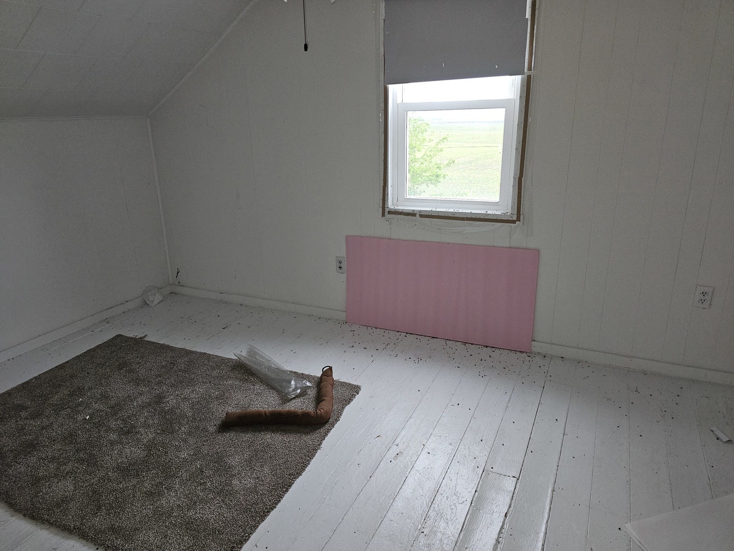 23018 Freeport Road Sterling, IL 61081 - Photo 9 of 19 an empty room with wooden floor and windows