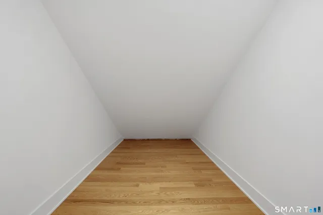a kitchen with a refrigerator and a sink