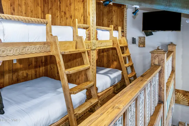 a view of walk in closet with large windows