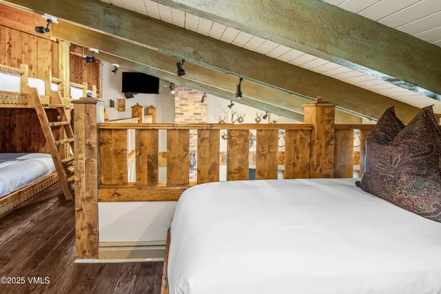 a view of a balcony with wooden floor