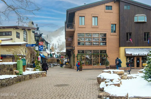 a view of street with large building