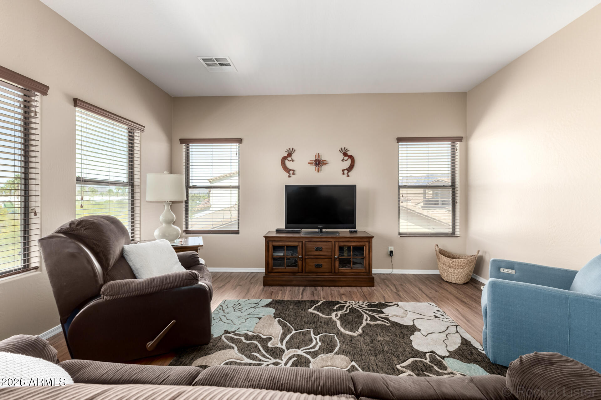 2756 South Powell Road Apache Junction, AZ 85119 - Photo 17 of 37 a living room with furniture and a flat screen tv