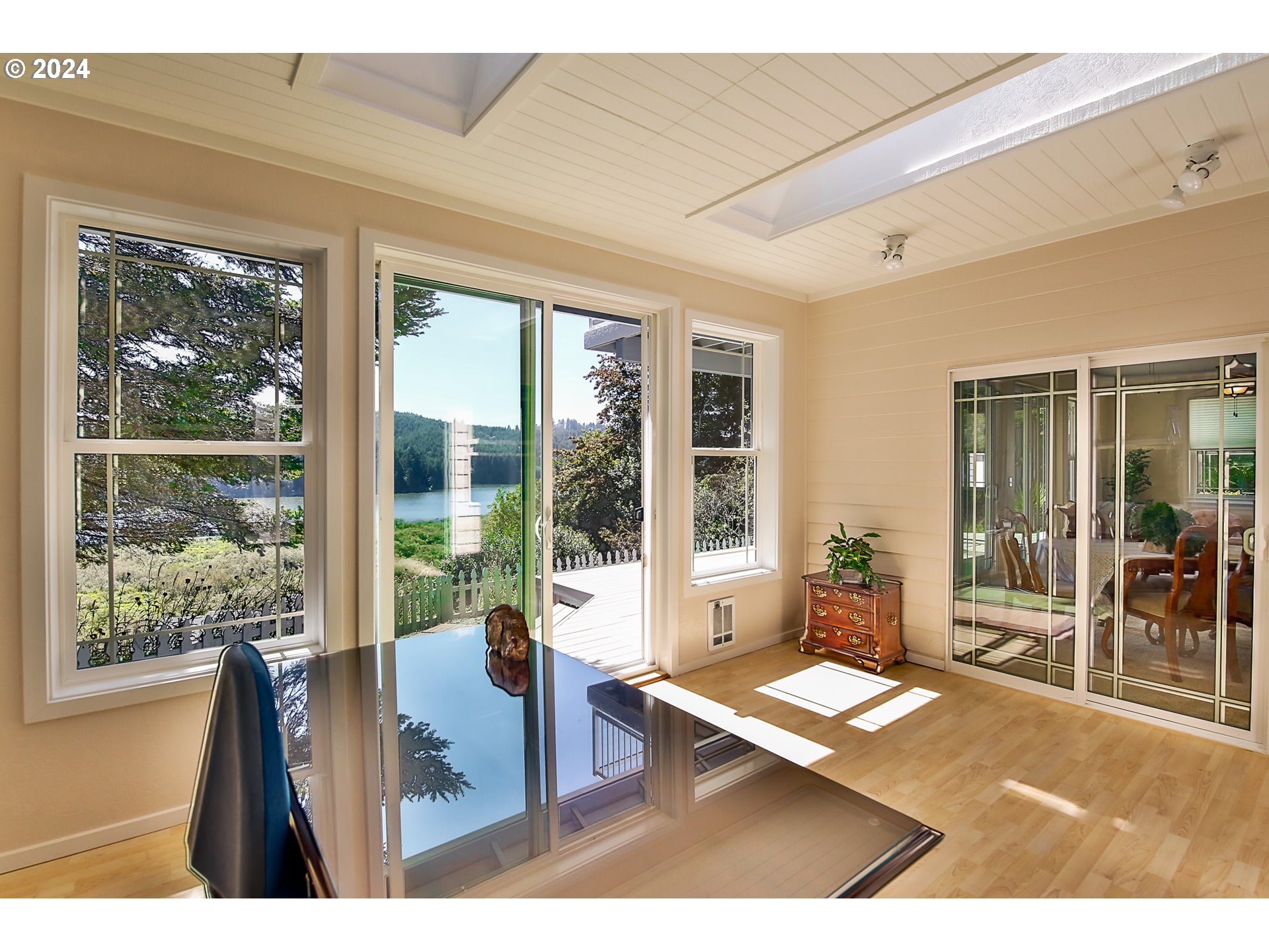 311 Council Hill Road Lakeside, OR 97449 - Photo 27 of 42 a living room with large window