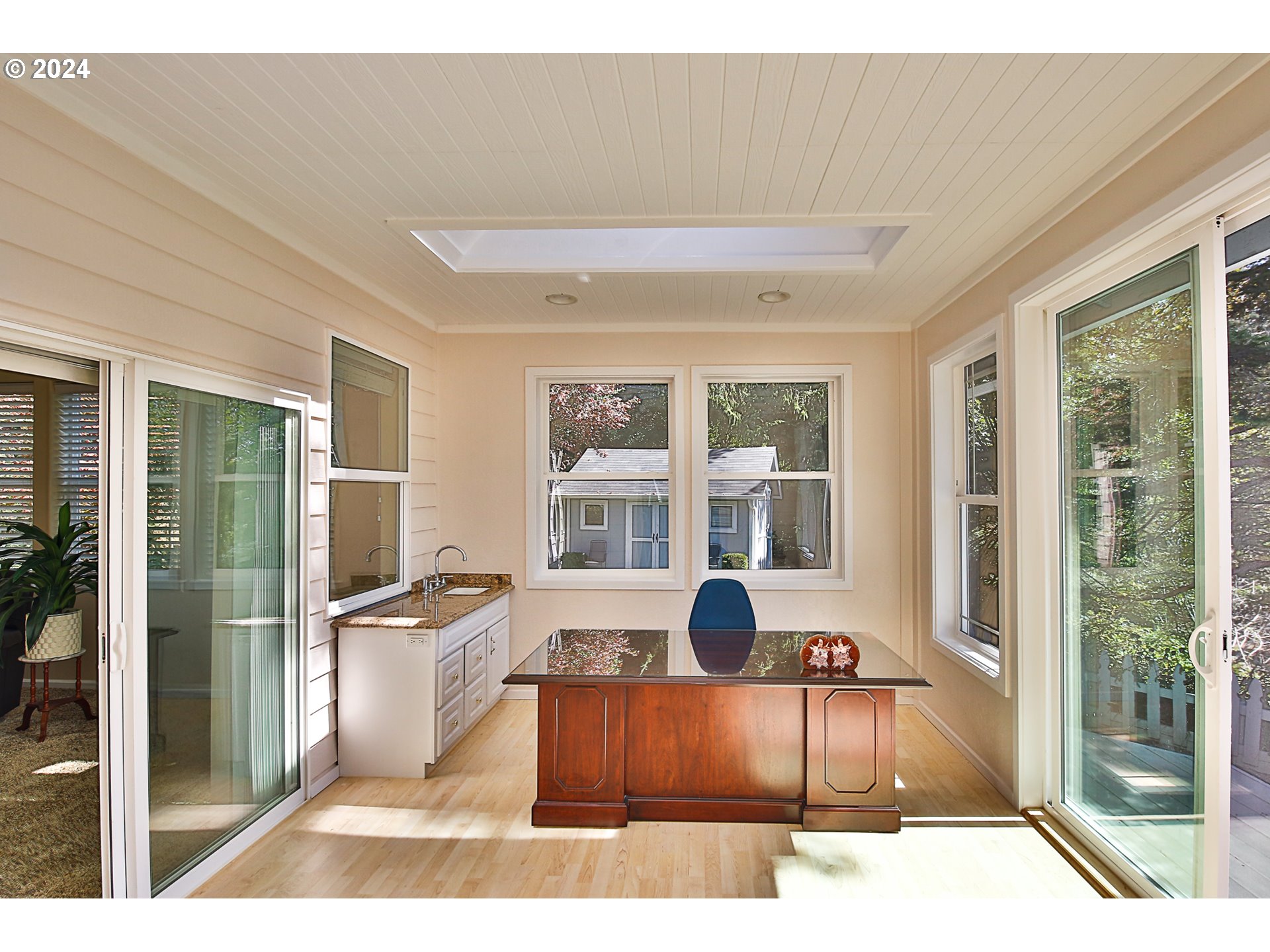 311 Council Hill Road Lakeside, OR 97449 - Photo 28 of 42 a living room with a couch and a large window