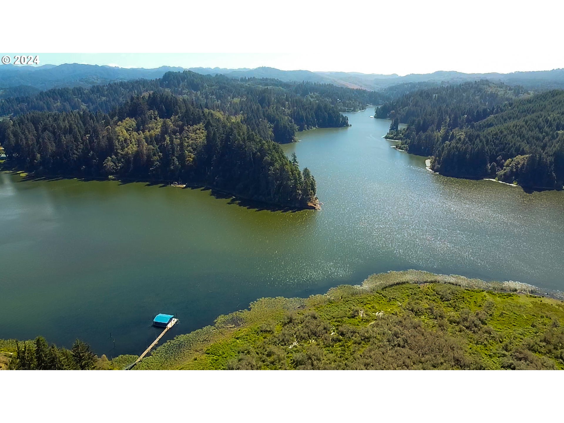 311 Council Hill Road Lakeside, OR 97449 - Photo 35 of 42 a view of a mountain in the distance