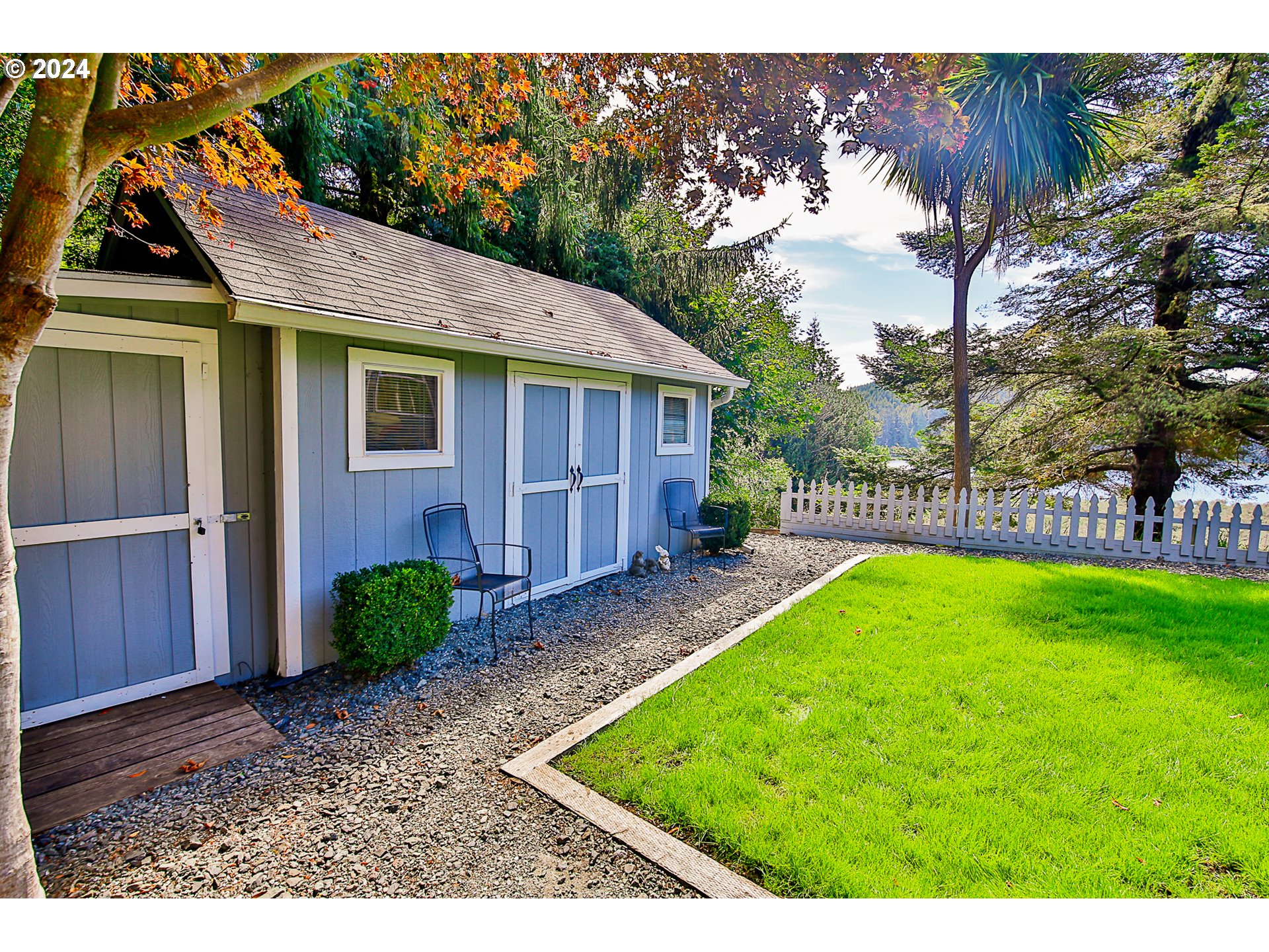 311 Council Hill Road Lakeside, OR 97449 - Photo 39 of 42 a view of a house with a yard