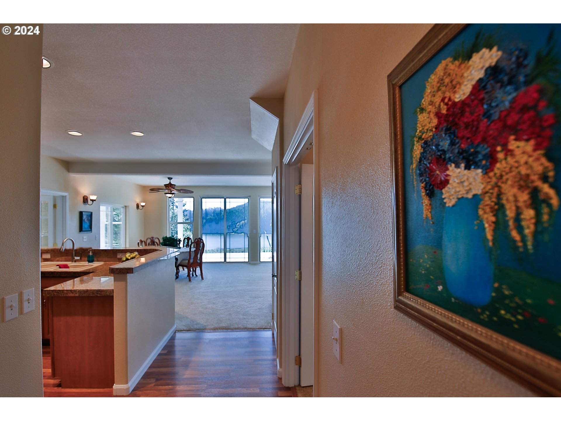 311 Council Hill Road Lakeside, OR 97449 - Photo 41 of 42 a open kitchen with stainless steel appliances granite countertop a refrigerator and a stove