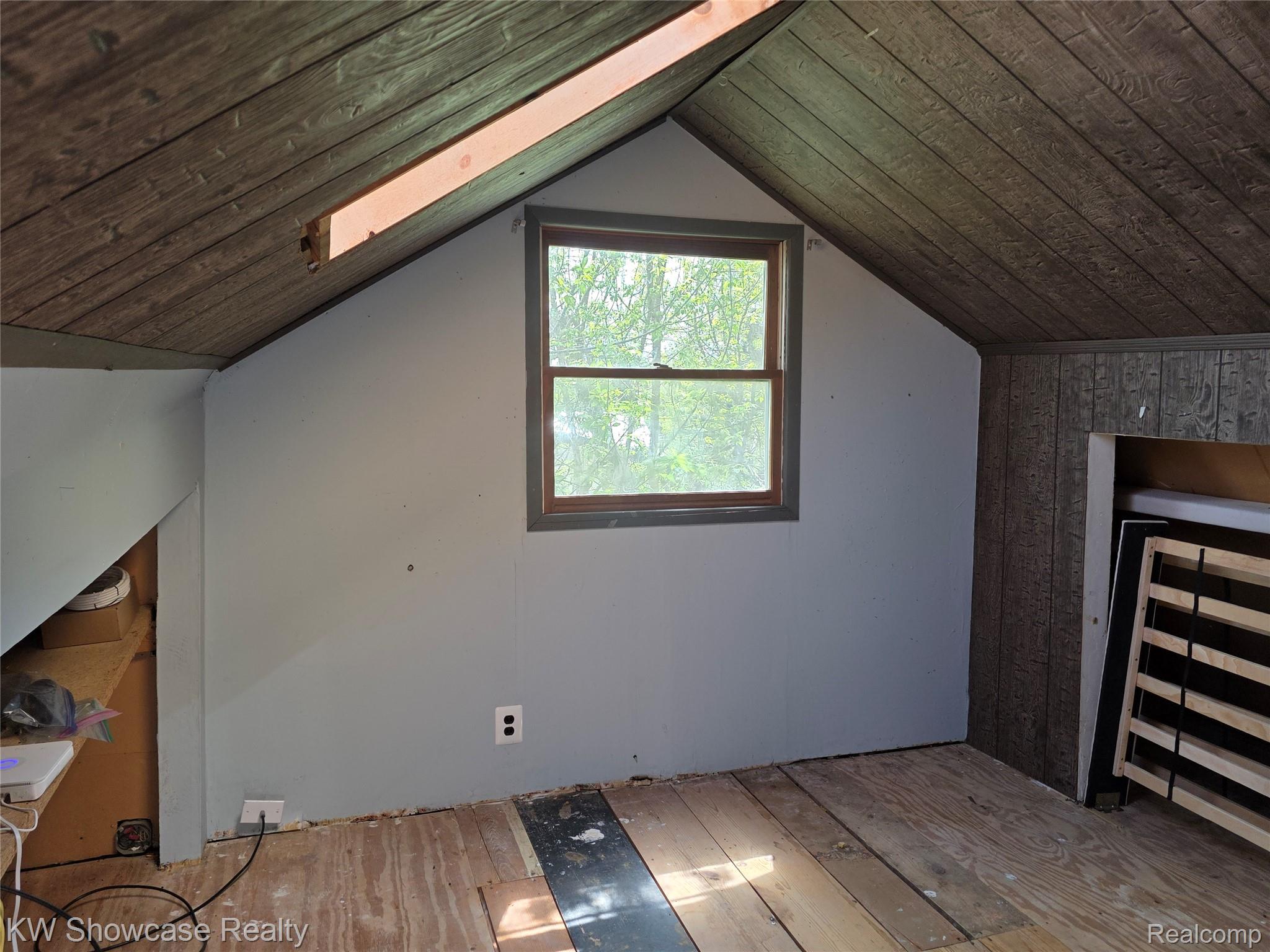 6354 Bennett Lake Road Fenton, MI 48430 - Photo 37 of 41 Bonus room with light wood finished floors