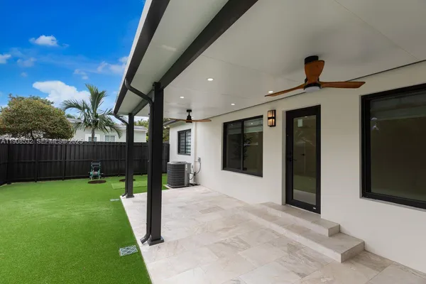 a view of a porch with a backyard