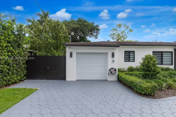 a backyard of a house with lots of green space