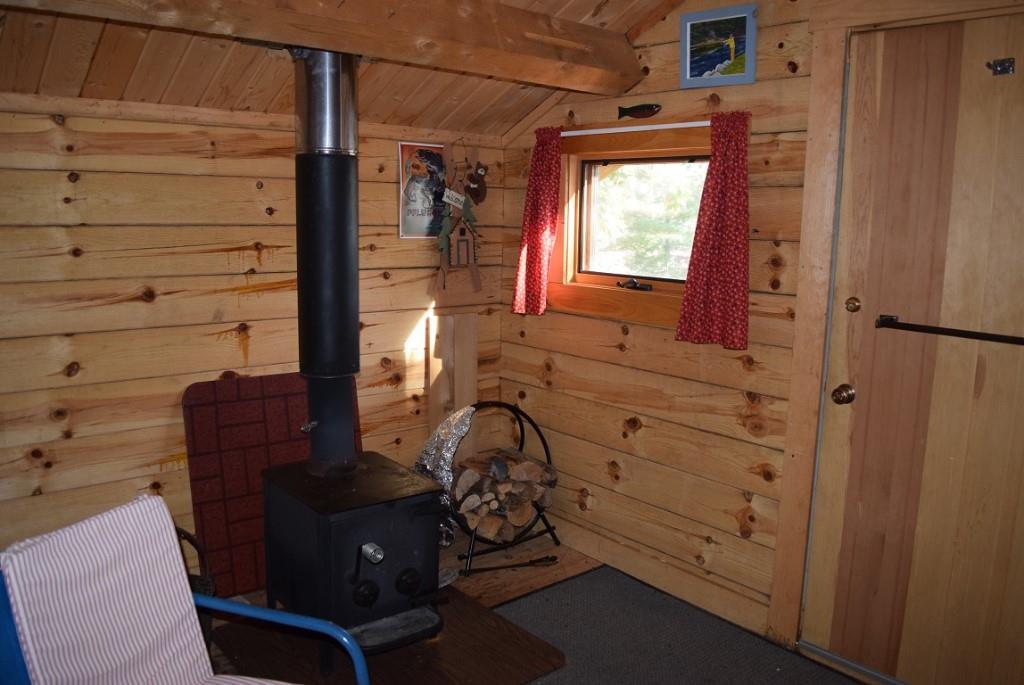 Lot#11 Southwest Pond Road Beddington, ME 04622 - Photo 17 of 35 The woodstove will keep you...