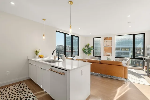 a kitchen with sink and window