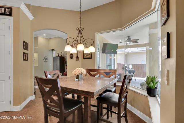 a bathroom with a tub and a shower