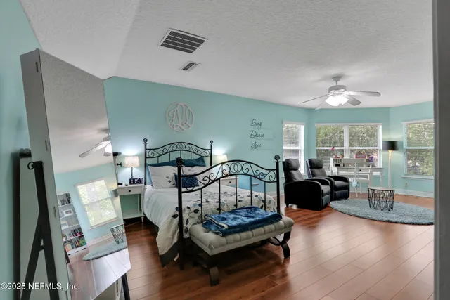 a view of a dinning table and chairs in the patio