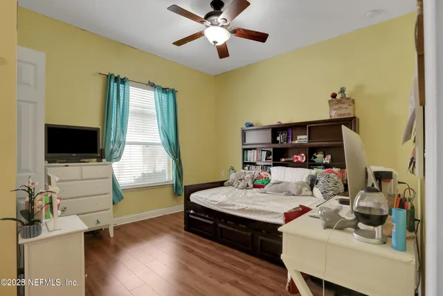 an outdoor space with furniture and umbrella