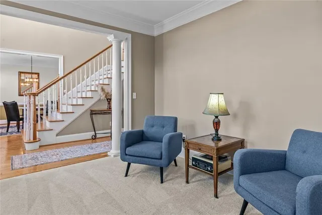a spacious bathroom with a granite countertop tub sink and mirror