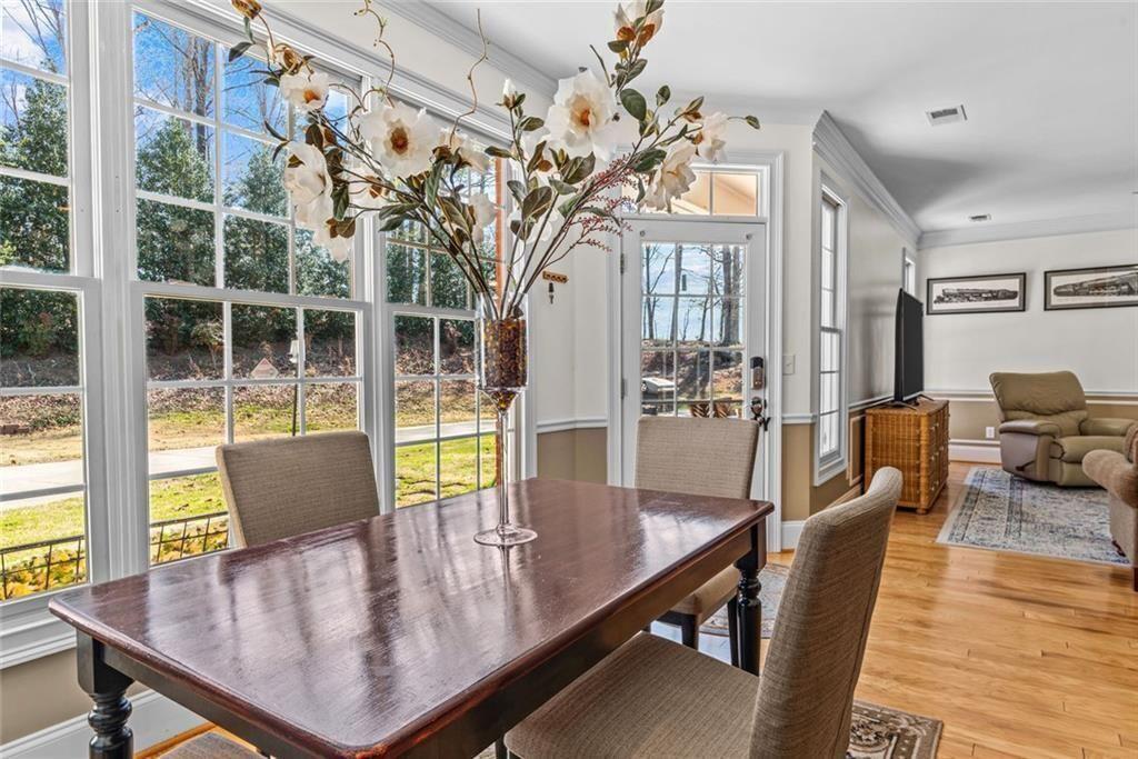 168 Jersey Road Oxford, GA 30054 - Photo 23 of 59 a view of a dining room with furniture window and outside view