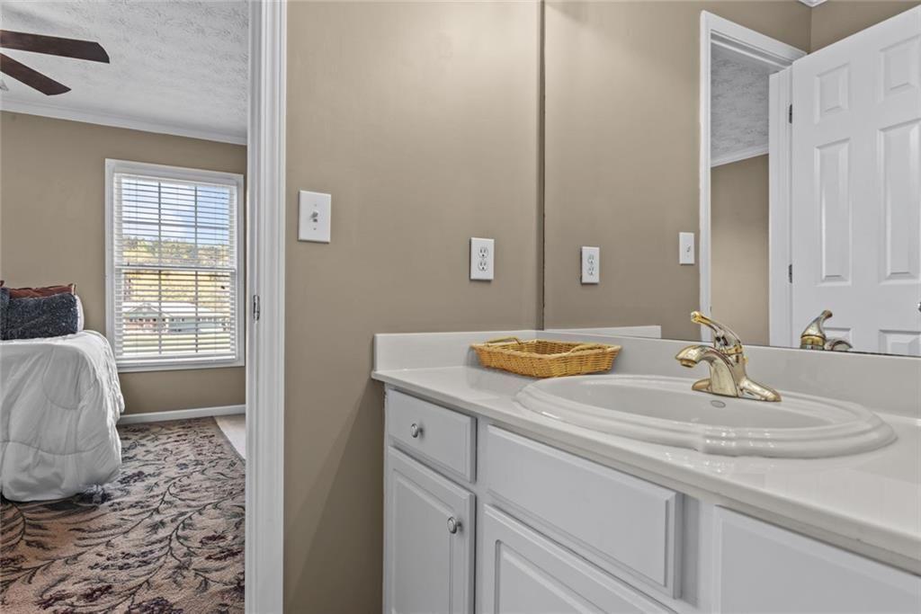 168 Jersey Road Oxford, GA 30054 - Photo 48 of 59 a bathroom with a sink and a mirror
