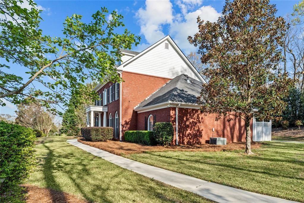 168 Jersey Road Oxford, GA 30054 - Photo 55 of 59 a front view of a house with a yard