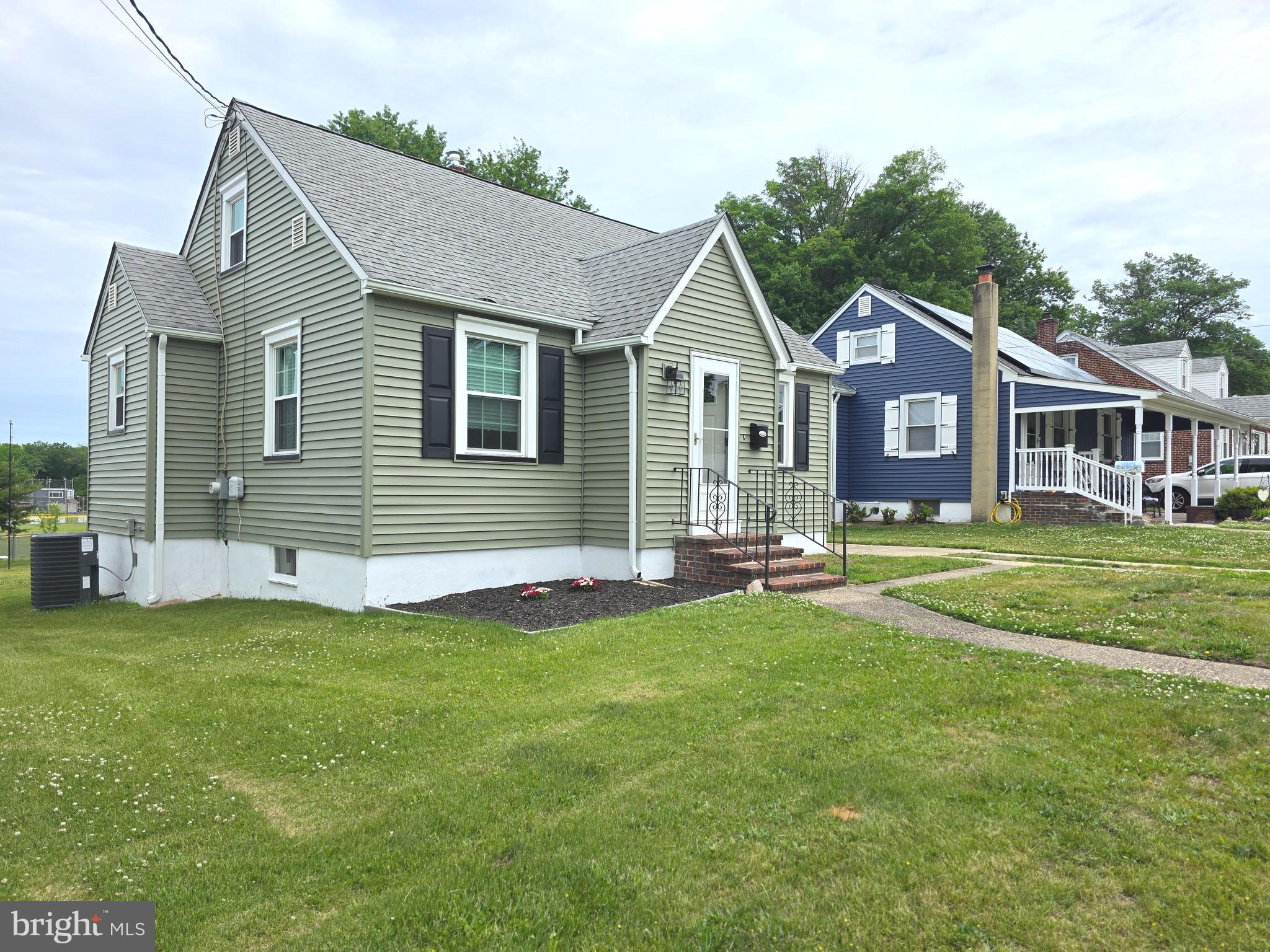 27 George Street Mount Ephraim, NJ 08059 - Photo 2 of 27 a front view of a house with a yard