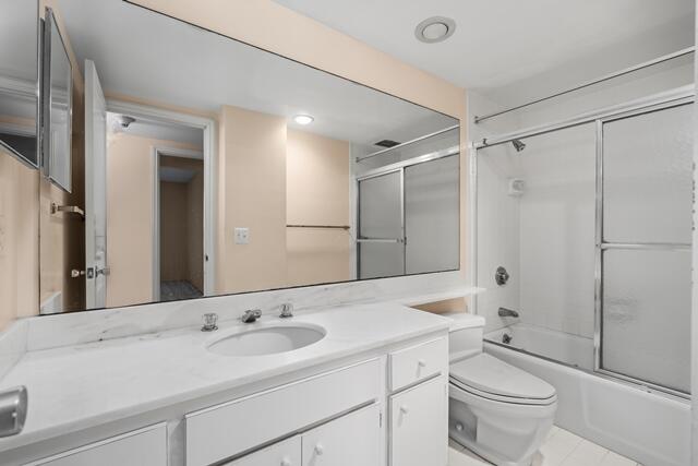 100 Worth Avenue, Unit 415 Palm Beach, FL 33480 - Photo 15 of 34 a bathroom with a sink a toilet and shower