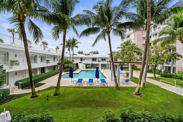 100 Worth Avenue, Unit 415 Palm Beach, FL 33480 - Photo 19 of 34 a view of outdoor space yard and swimming pool
