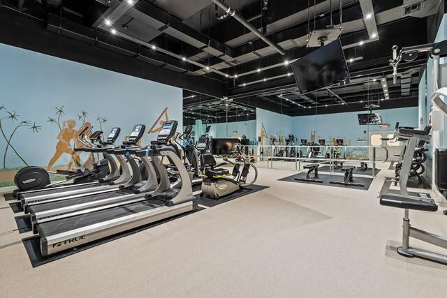 100 Worth Avenue, Unit 415 Palm Beach, FL 33480 - Photo 20 of 34 a view of a room with gym equipment