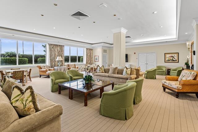 100 Worth Avenue, Unit 415 Palm Beach, FL 33480 - Photo 22 of 34 a living room with furniture and a large window
