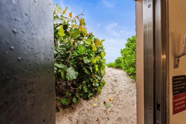 100 Worth Avenue, Unit 415 Palm Beach, FL 33480 - Photo 26 of 34 a close up of a vase with flowers