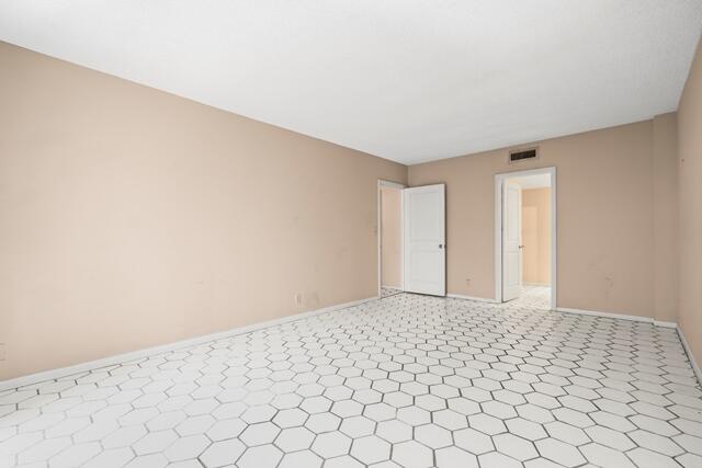 100 Worth Avenue, Unit 415 Palm Beach, FL 33480 - Photo 9 of 34 a view of an empty room