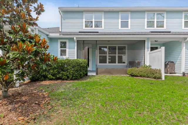 front view of a house with a yard