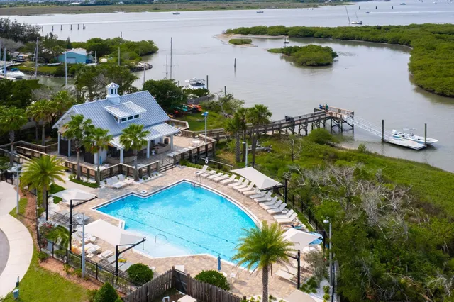 an aerial view of a house with outdoor space