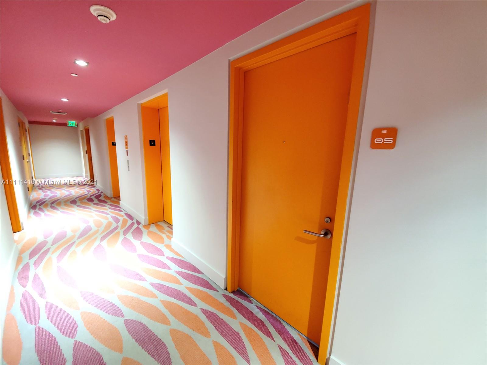 31 Southeast 6th Street, Unit 505 Miami, FL 33131 - Photo 29 of 71 a bathroom with a sink and a mirror