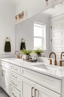 a bathroom with sink a mirror and window