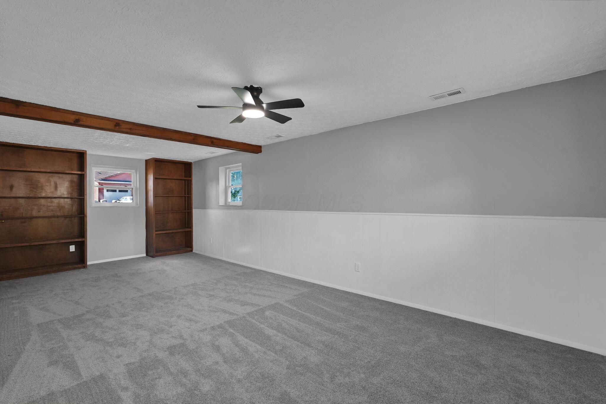 208 Cumberland Road Delaware, OH 43015 - Photo 23 of 37 Lower level rec room is flooded with natural lighting, freshly painted, has new carpet and and ceiling fan/light! It's ready for your enjoyment!