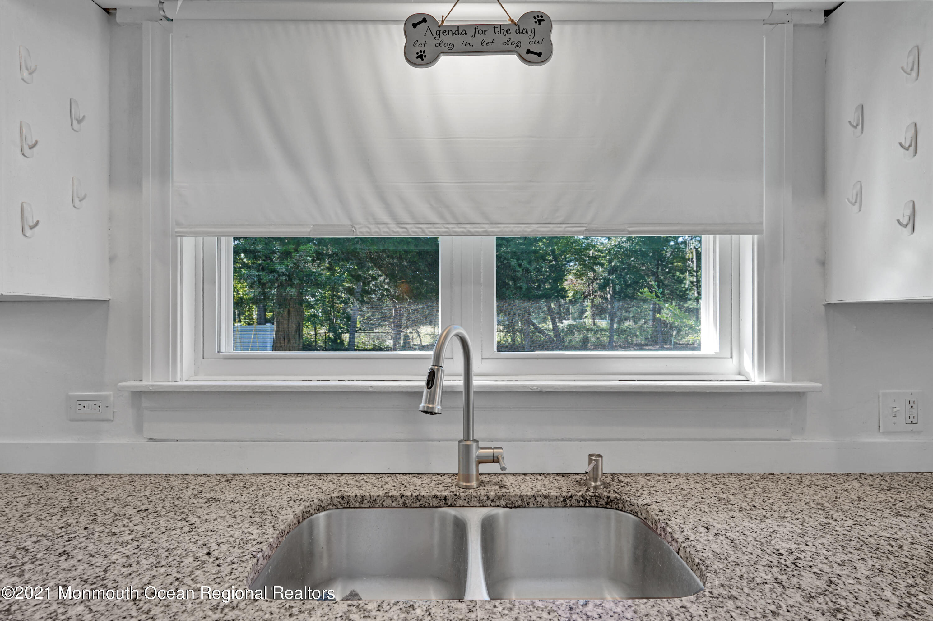 346 Cherry Quay Road Brick, NJ 08723 - Photo 13 of 27 a kitchen with a sink and a window